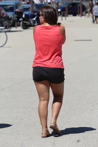 Thick girl in pink top and black shorts with vpl