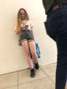 Cute Candid Teen in Shorts Leaning Against the Wall Creepshot