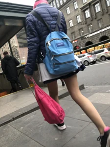 Girl With Skinny Legs in Pahtyhose and a Skirt Walking Down the Stairs Street Candid Gallery
