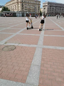 Couple of candid teen in shorts with scooters on the street creepshots, hot pale legs