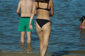 Sexy Booty in Black Swimsuit Beach Creepshot Closeups Gallery
