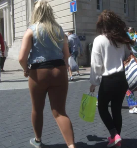 Thick blonde showing her panties in see through leggings