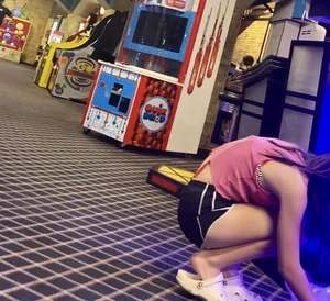 Skinny teens in the arcade
