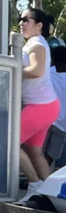 Mature in pink tight shorts
