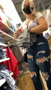 Two blonde teens shopping