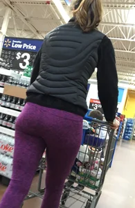 Milf shopping with a nice ass in purple leggings