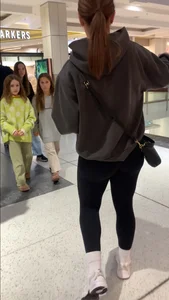 Perfect round ass showing off her long socks and black leggings