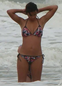 Sexy light skin black girl in a bikini with incredible body