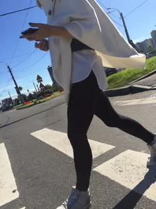 Blonde Girl With Fit Muscular Legs in Tight Black Jeans and Sneakers on a Crosswalk  - Street Creepshots Collection