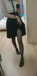 Skinny Girl in a Skirt and in Black Pantyhose Showing Her Thin Leg - Bedroom Selfie in the Mirror