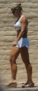 Fit babe in white shorts with big boobs in athletic top