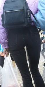 Juicy ass in black tight jeans and nice skinny legs street closeups