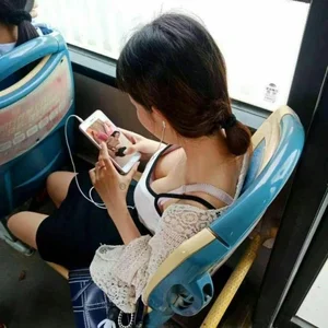 Girl in the Bus Boobs Creepshot