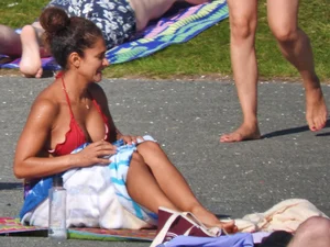 Hot ass milf with an amazing body at the pool