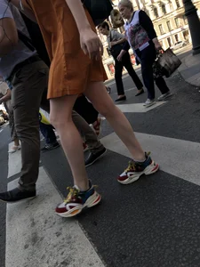 Cute Teen Girl in a Dress With Slim Legs Standing in the Subway Train, Then Crossing the Street Photo Gallery
