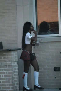 Sexy ebony Tilted Kilt employee in her uniform