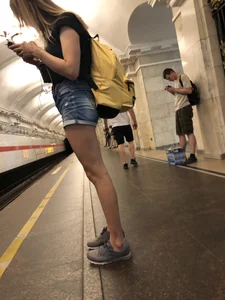 Cute Skinny Teen in Jean Mini Shorts Standing on the Subway Platform