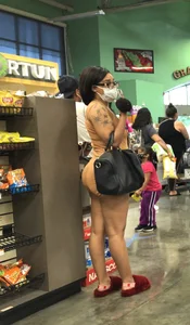 Latina with hard nipples and a big booty in tight spandex shorts outfit