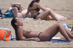 Girls on a nude beach in Bibione, Italy