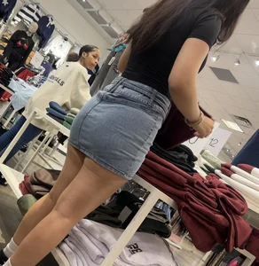 Cute salesgirl with tight Jean skirt showing some legs (OC)
