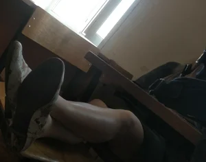 Girl with Legs in Pantyhose on Chair