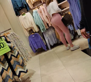Blonde girl with a great ass in tight pink leggings
