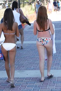 Two cute teens in bikinis