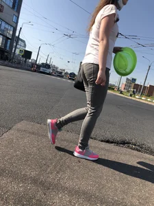 Nice candid girl wearing tight grey sweatpants, a mask and a hat