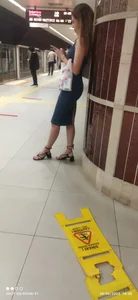 Candid babe with skinny ankles at the train station