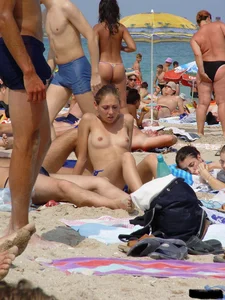 Beach voyeur girls in bikinis, thongs and topless
