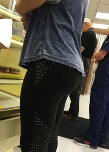 Nice round ass in leggings in line with no face