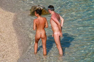 Ula FKK Sexy brunette on a nude beach topless, bottomless and with blue thong