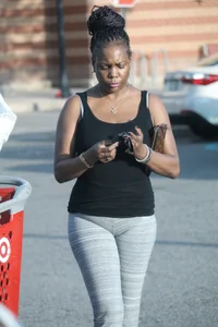 Ebony milf out shopping in grey leggings