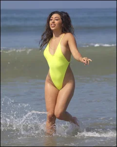 Sexy ass beach babe in a yellow thong swimsuit