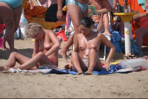 Girls on a nude beach in Bibione, Italy