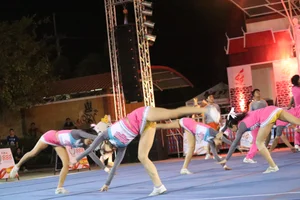 Bunch of athletic Thai cheerleaders at a competition