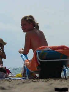 Sexy candid topless and nude beach girls