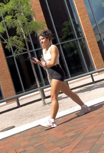 Curly Campus Brunette with amazing Bubble Butt in Tight Shorts (oc)