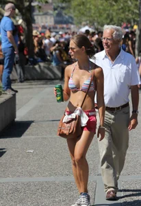 Boobs out in public in either bikini tops or bras
