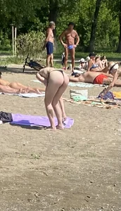 Large collection of hot beach girls lying on the beach and bending over