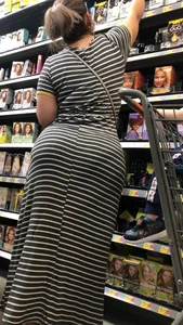 Beautiful Latina with amazing body in long dress