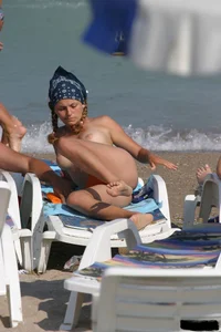 Beach voyeur girls in bikinis, thongs and topless
