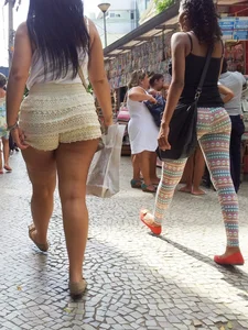 Big ass in shorts and ebony friend in leggings