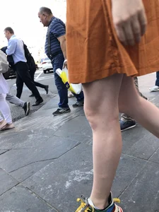 Cute Teen Girl in a Dress With Slim Legs Standing in the Subway Train, Then Crossing the Street Photo Gallery