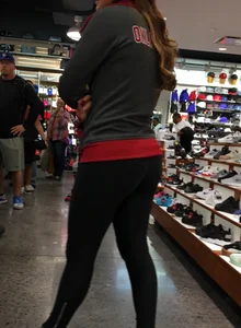 Pretty girl shopping with boyfriend in leggings with a nice ass