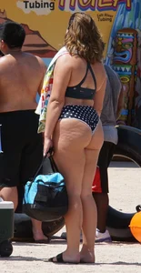 Girls in bikinis getting ready for tubing