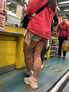 Muscular Legs in Shorts Supermarket Creepshot