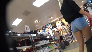 Blonde with a nice ass shopping in little jean shorts