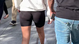Candid brunette chick with a nice ass and vtl in spandex shorts