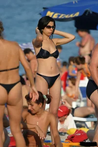 Beach voyeur girls in bikinis, thongs and topless